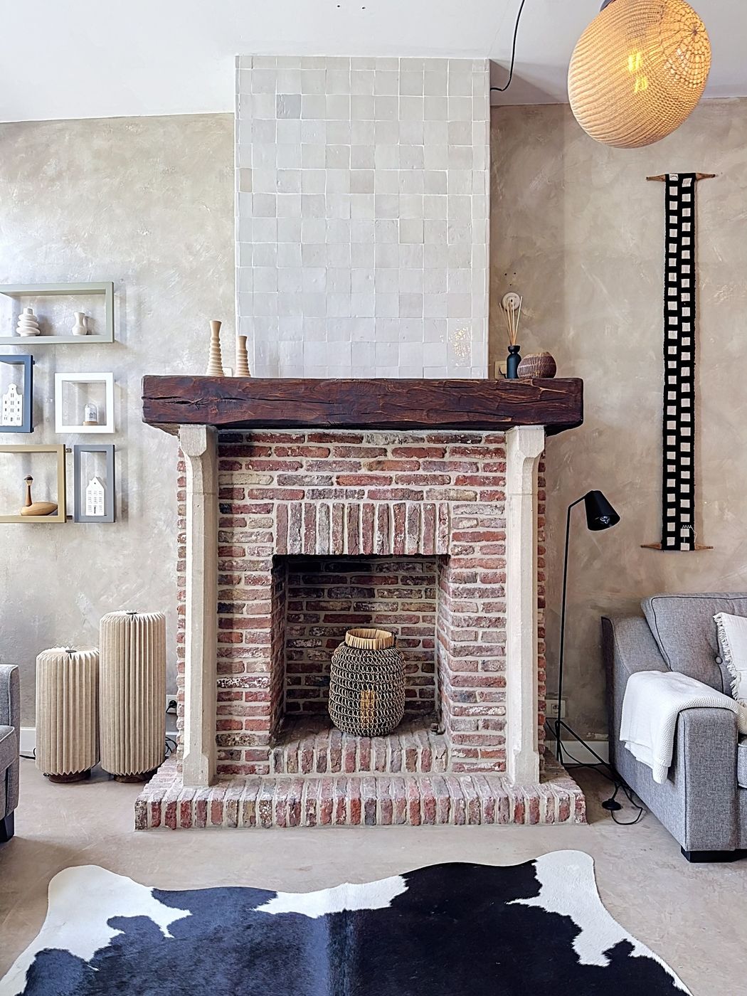 The fireplace and reclaimed beam mantel